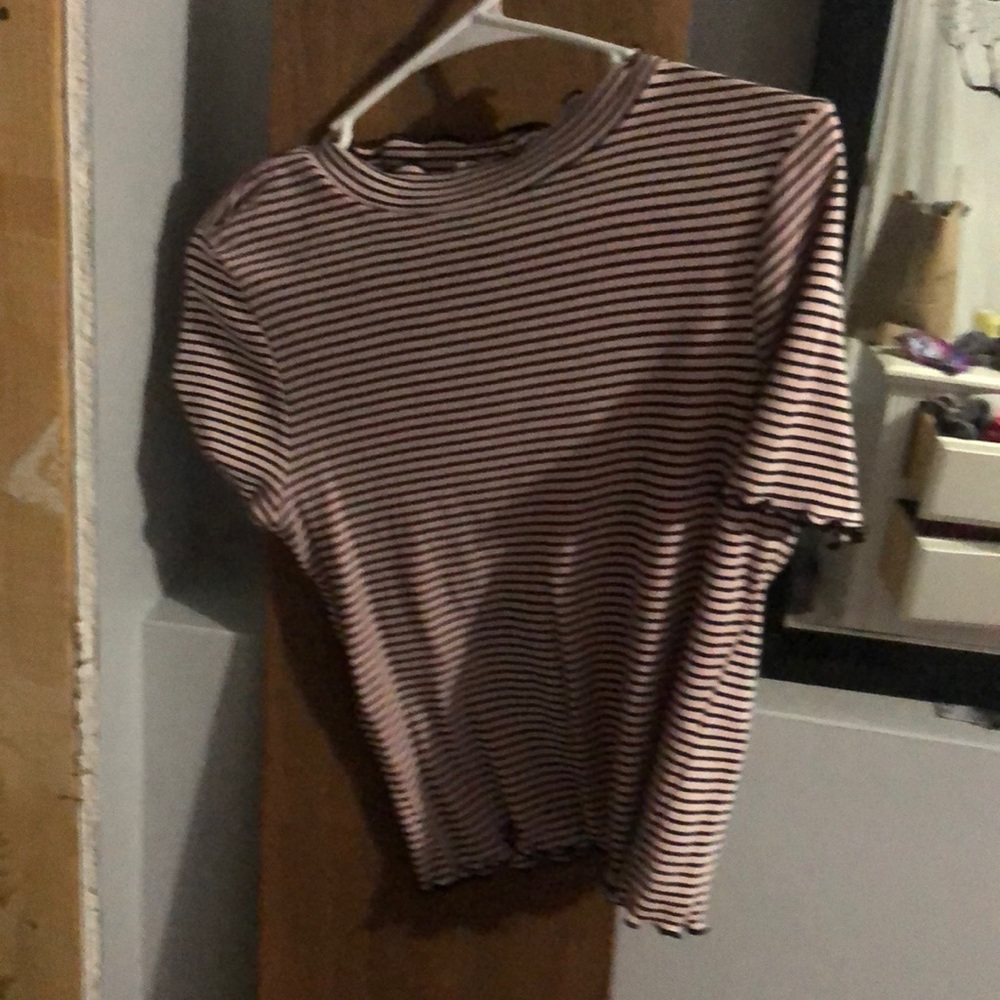 pink and black striped shirt